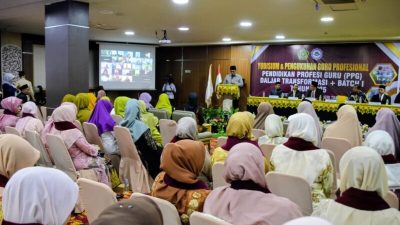 Bupati Haili Yoga Kukuhkan Guru Profesional 